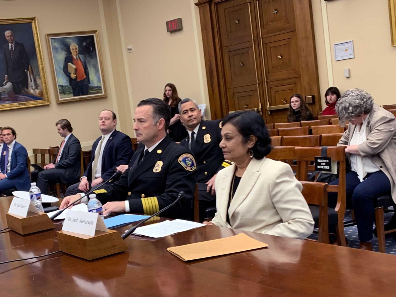 ESRI Executive Director Judy Jeevarajan, at right, and San Bernardino County Fire Chief Dan Munsey testify at a U.S. House Science, Space, and Technology subcommittee hearing on emerging electric vehicle fire concerns.