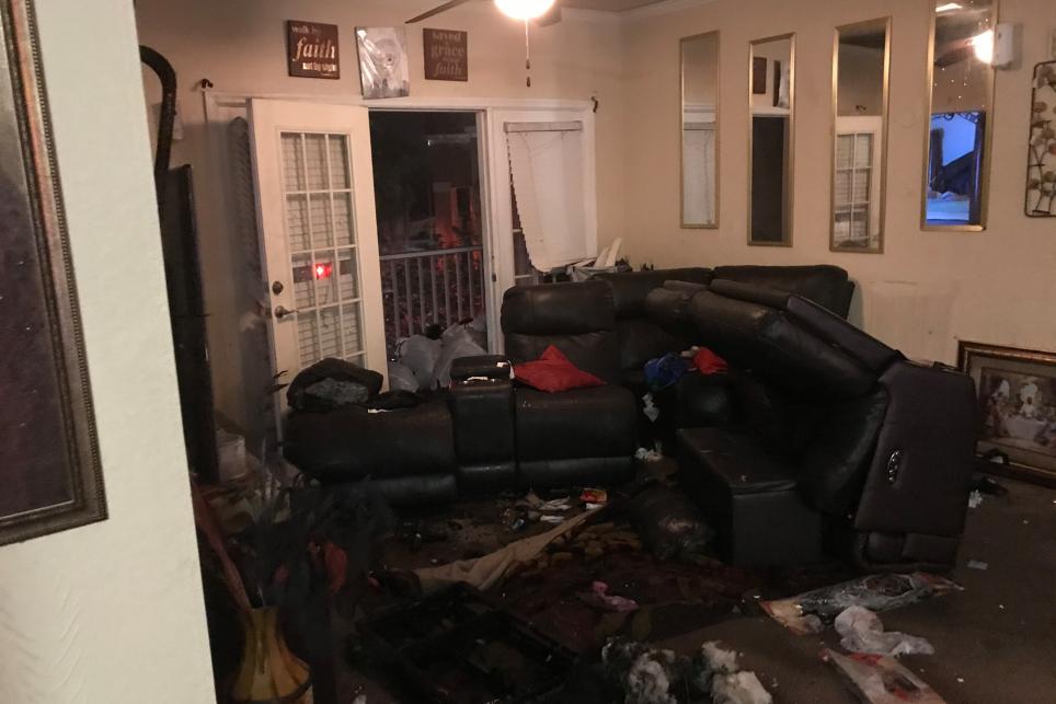 living room furniture slightly damaged by flames