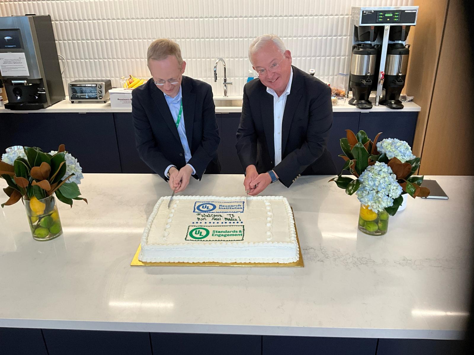 Terrence R. Brady, ULRI president and CEO and ULSE board chair, welcomes employees as part of a week-long celebration of the organizations’ move to Evanston. Kevin Mehaffey, director of facilities and expansion for ULRI/ULSE, looks on. 