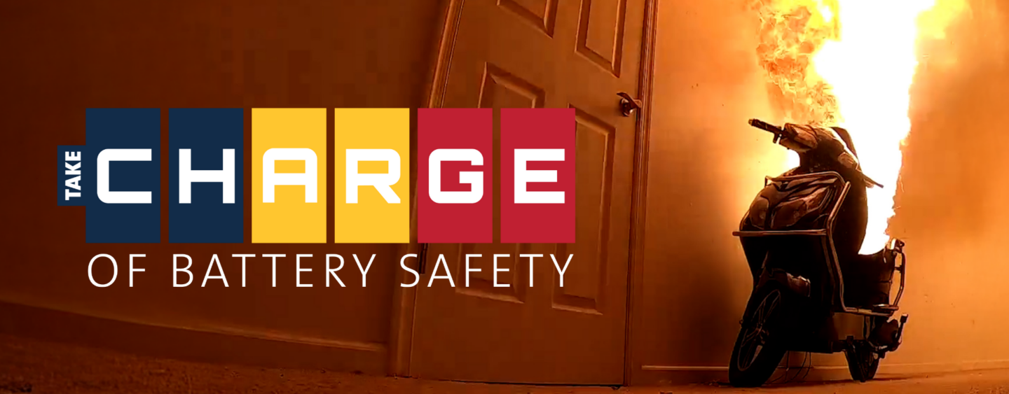 Electric scooter on fire with the “Take C.H.A.R.G.E. of Battery Safety” logo.